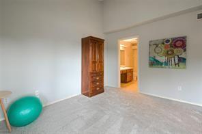14151 Montfort Dr Unit 201, Dallas, TX 75254 - unfurnished bedroom with carpet flooring and baseboards