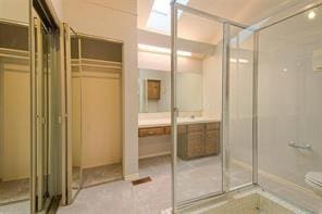 14151 Montfort Dr Unit 201, Dallas, TX 75254 - full bath featuring a shower stall