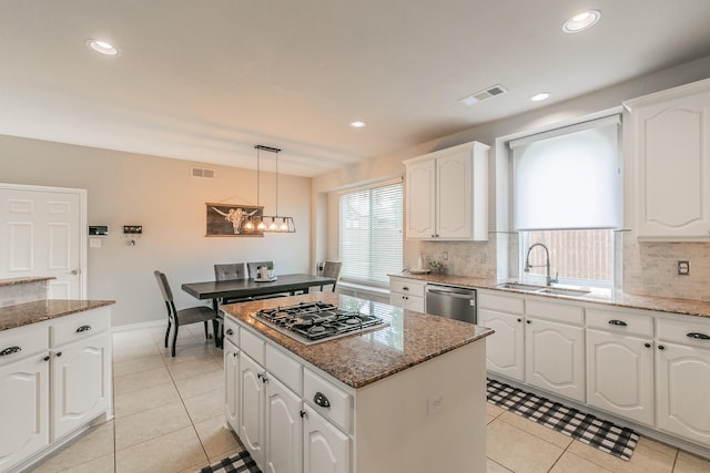 5424 Yellow Birch Dr, Fort Worth, TX 76244 - kitchen with stainless steel appliances, a sink, decorative backsplash, light tile patterned floors, and recessed lighting