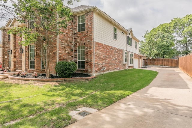 5424 Yellow Birch Dr, Fort Worth, TX 76244 - view of side of home featuring driveway, brick siding, and a garage