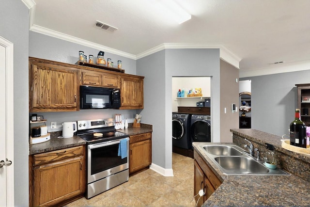 2715 Myopia Ct, Dallas, TX 75253 - kitchen featuring black microwave, electric range, washing machine and clothes dryer, a sink, and dark countertops