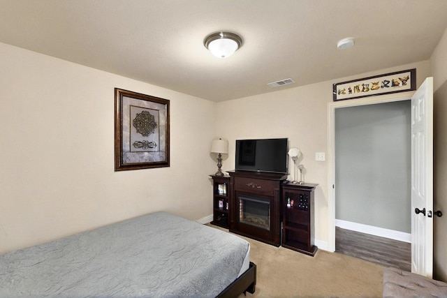 2715 Myopia Ct, Dallas, TX 75253 - carpeted bedroom with baseboards
