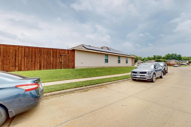 2715 Myopia Ct, Dallas, TX 75253 - view of property exterior featuring solar panels