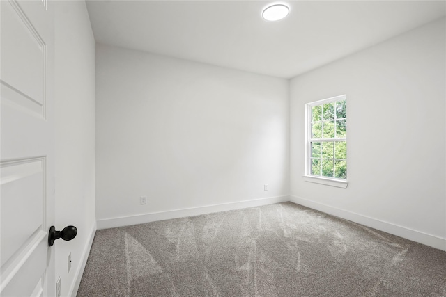 2522 Seevers Ave, Dallas, TX 75216 - spare room featuring carpet flooring and baseboards