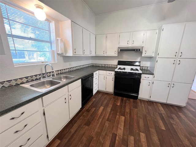 1801 6th St, Brownwood, TX 76801 - kitchen with gas range oven, black dishwasher, a sink, under cabinet range hood, and dark countertops