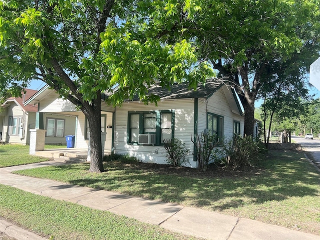 1801 6th St, Brownwood, TX 76801 - view of front of house with a front lawn and cooling unit
