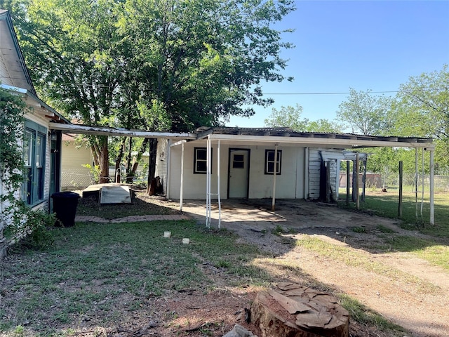 1801 6th St, Brownwood, TX 76801 - view of outbuilding featuring an attached carport