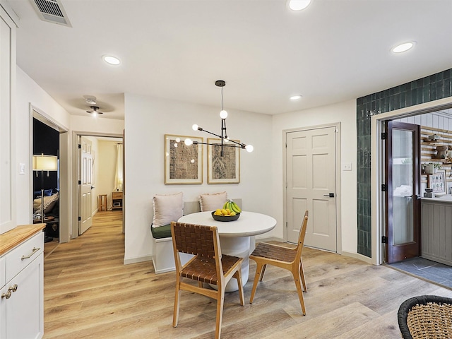 6512 Elkhurst Dr, Plano, TX 75023 - dining space with light wood-style floors, recessed lighting, a chandelier, and baseboards