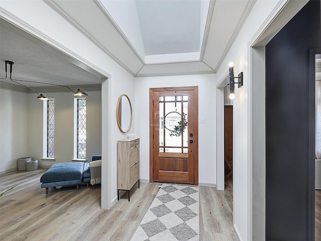 6512 Elkhurst Dr, Plano, TX 75023 - foyer featuring light wood-style flooring, baseboards, and a raised ceiling