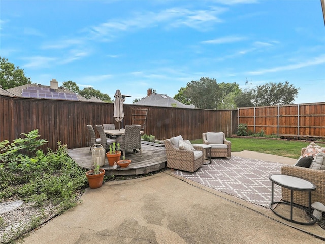 6512 Elkhurst Dr, Plano, TX 75023 - fenced backyard with a patio, outdoor dining area, and a wooden deck