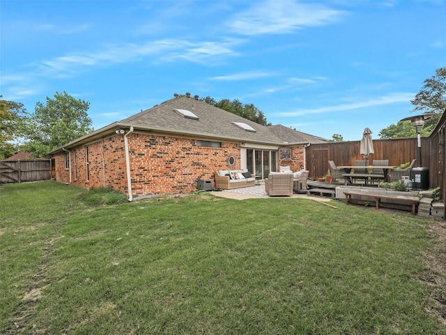 6512 Elkhurst Dr, Plano, TX 75023 - rear view of property with an outdoor living space, brick siding, a shingled roof, and a patio area