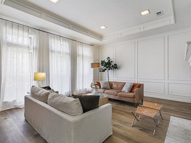 6512 Elkhurst Dr, Plano, TX 75023 - living room featuring a decorative wall and wood finished floors
