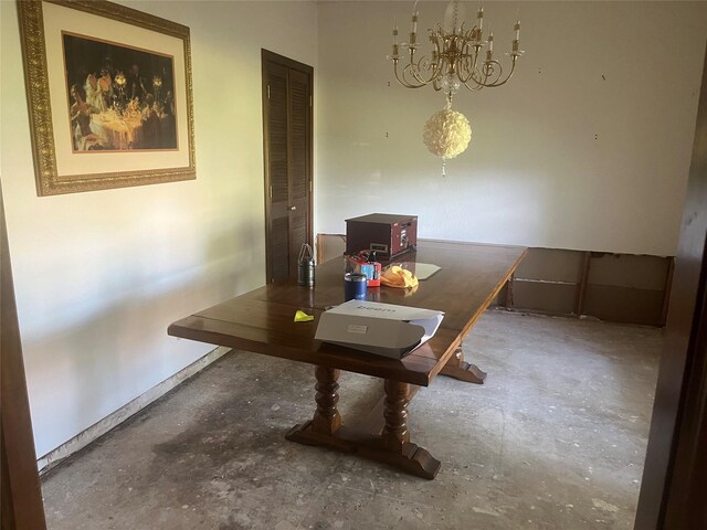 1212 Oakwood Trl, Southlake, TX 76092 - dining area featuring concrete floors, a chandelier, and a desk