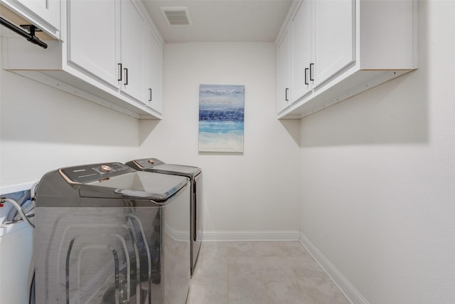 1308 Redbrick Ln, Northlake, TX 76247 - washroom featuring cabinet space, washing machine and dryer, and baseboards