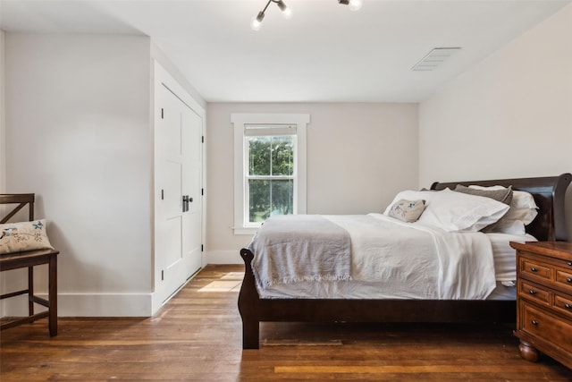 3718 Tulsa Way, Fort Worth, TX 76107 - bedroom with wood finished floors
