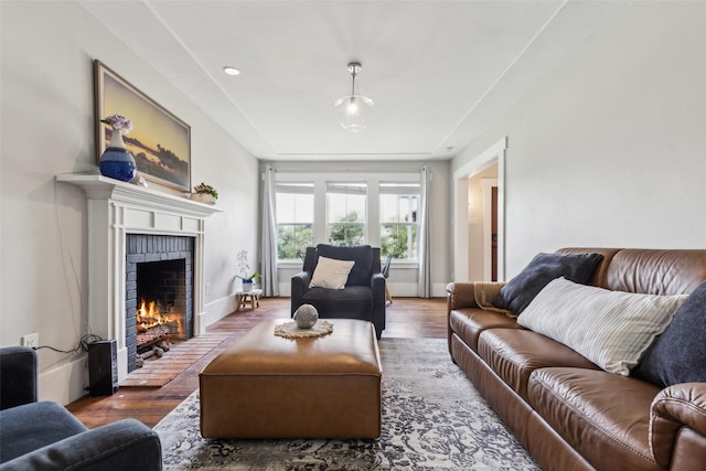 3718 Tulsa Way, Fort Worth, TX 76107 - living area featuring a brick fireplace and wood finished floors