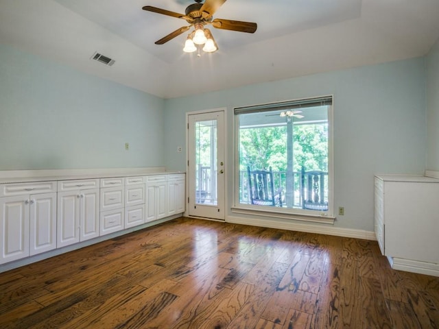 7710 Ravenswood Rd, Granbury, TX 76049 - empty room with wood finished floors, ceiling fan, baseboards, and lofted ceiling