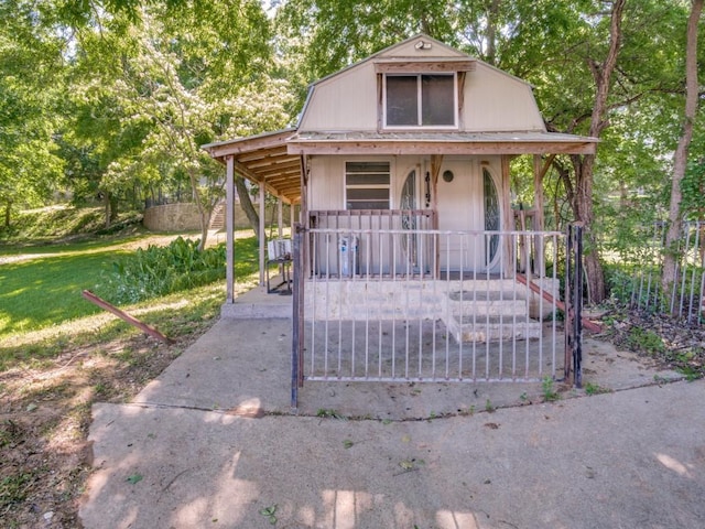 7710 Ravenswood Rd, Granbury, TX 76049 - view of front of property featuring covered porch