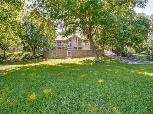 7710 Ravenswood Rd, Granbury, TX 76049 - view of green lawn with stairway