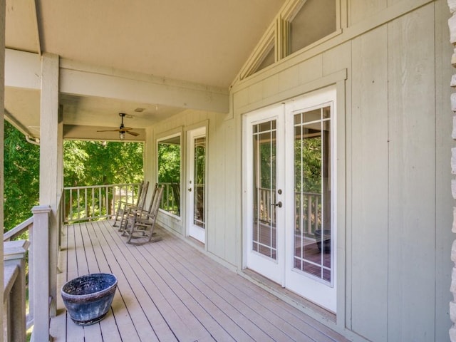 7710 Ravenswood Rd, Granbury, TX 76049 - wooden terrace with french doors and a ceiling fan