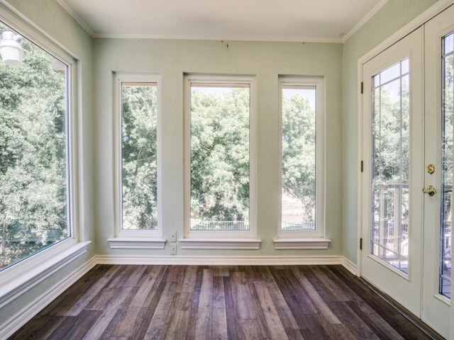 7710 Ravenswood Rd, Granbury, TX 76049 - unfurnished sunroom featuring wood finished floors, ornamental molding, baseboards, and french doors