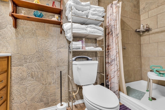 1006 Beaver St, Lacy Lakeview, TX 76705 - bathroom featuring a stall shower, toilet, and vanity
