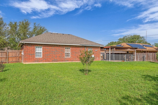 1006 Beaver St, Lacy Lakeview, TX 76705 - rear view of house featuring brick siding and a shingled roof