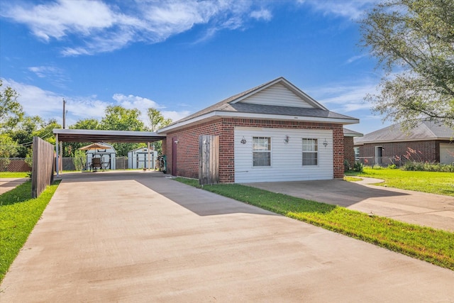 1006 Beaver St, Lacy Lakeview, TX 76705 - view of front facade featuring concrete driveway, brick siding, a carport, and a shingled roof