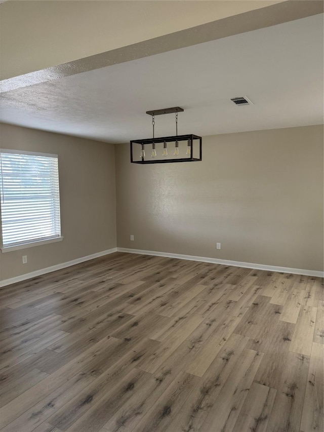 711 S Farmington Rd, Howe, TX 75459 - spare room with wood finished floors and baseboards