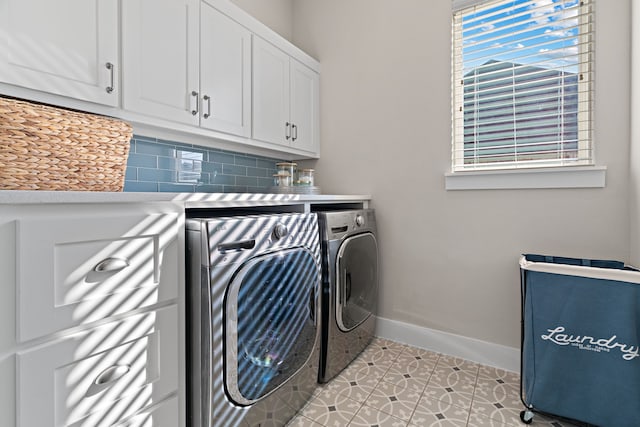 410 Travelers Ter, Argyle, TX 76226 - laundry room with independent washer and dryer, cabinet space, light tile patterned floors, and baseboards