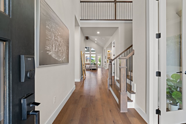 410 Travelers Ter, Argyle, TX 76226 - entryway featuring hardwood / wood-style flooring, stairs, baseboards, vaulted ceiling, and recessed lighting