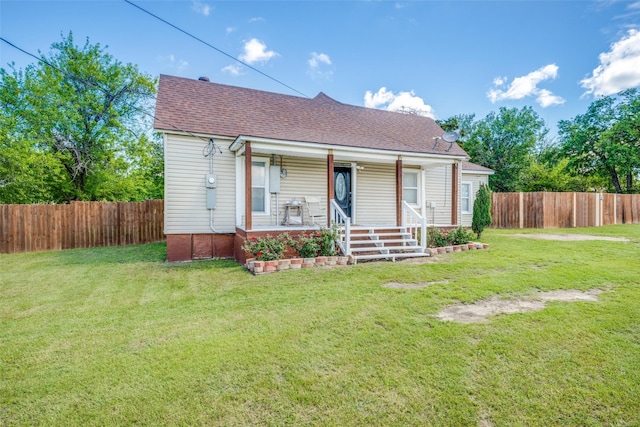 101 E Mulberry St, Decatur, TX 76234 - rear view of property with a porch and roof with shingles
