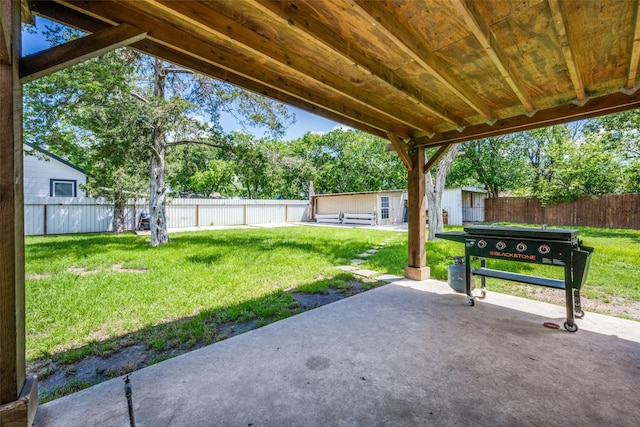 101 E Mulberry St, Decatur, TX 76234 - view of patio with an outbuilding