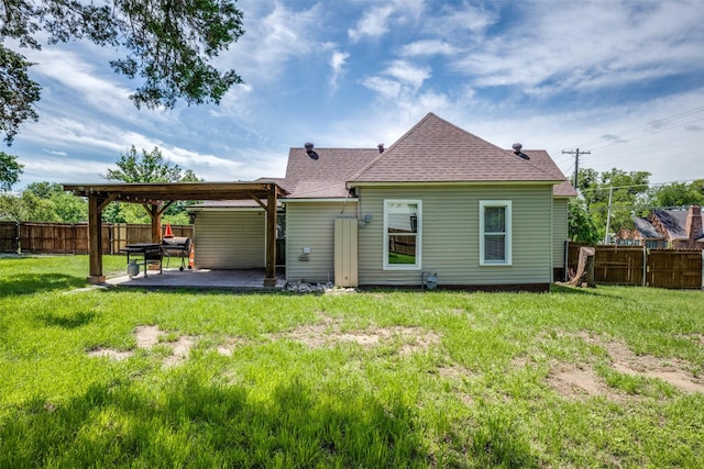 101 E Mulberry St, Decatur, TX 76234 - rear view of house featuring a patio area and a shingled roof