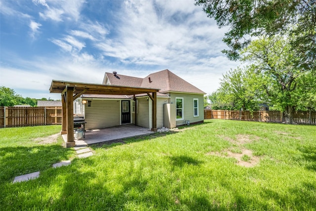 101 E Mulberry St, Decatur, TX 76234 - back of house with a patio area and roof with shingles