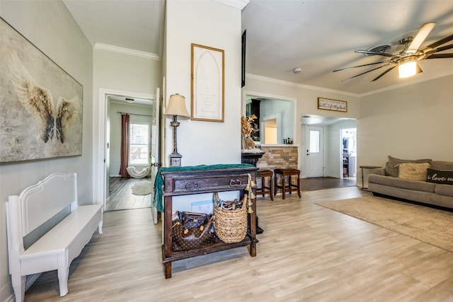 101 E Mulberry St, Decatur, TX 76234 - living room featuring a ceiling fan, wood finished floors, crown molding, baseboards, and pool table
