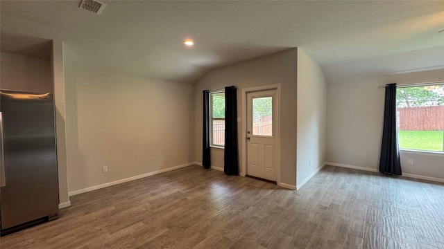 757 High Summit Trl, Fort Worth, TX 76131 - entrance foyer featuring lofted ceiling, wood finished floors, baseboards, and recessed lighting