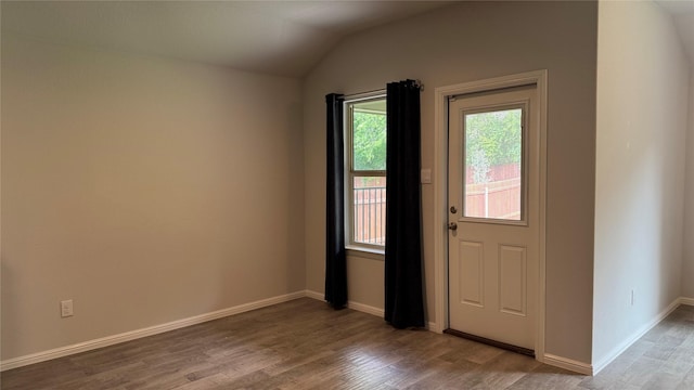 757 High Summit Trl, Fort Worth, TX 76131 - entrance foyer with wood finished floors, lofted ceiling, and baseboards