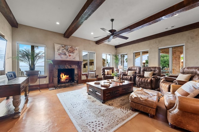 1612 S Lakeshore Dr, Rockwall, TX 75087 - living room featuring beamed ceiling, a fireplace, a ceiling fan, and recessed lighting