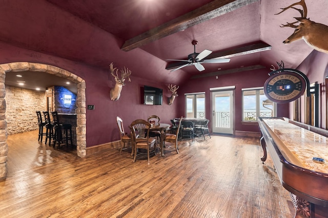 1612 S Lakeshore Dr, Rockwall, TX 75087 - dining area featuring hardwood / wood-style floors, a fireplace, and a ceiling fan