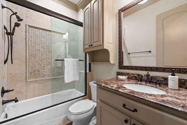 1612 S Lakeshore Dr, Rockwall, TX 75087 - bathroom featuring vanity, toilet, and bath / shower combo with glass door