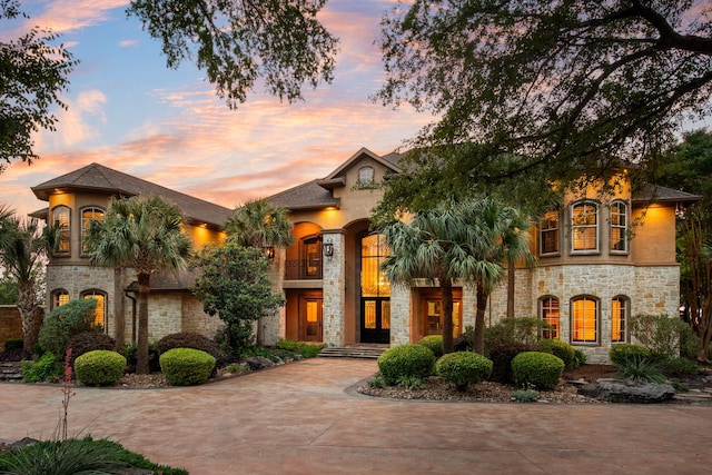 1612 S Lakeshore Dr, Rockwall, TX 75087 - mediterranean / spanish-style house featuring stone siding
