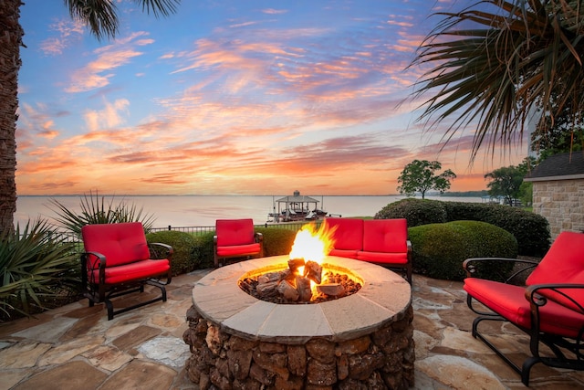 1612 S Lakeshore Dr, Rockwall, TX 75087 - view of patio / terrace featuring an outdoor fire pit and a water view