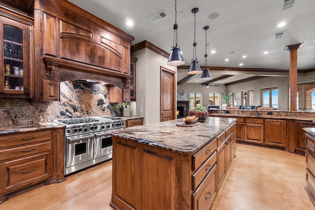 1612 S Lakeshore Dr, Rockwall, TX 75087 - kitchen featuring double oven range, crown molding, a kitchen island, decorative backsplash, and recessed lighting