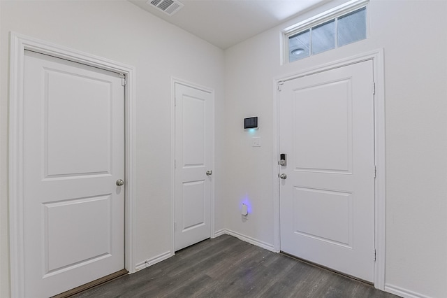 397 War Emblem Ln, Waxahachie, TX 75165 - entryway featuring dark wood-style floors and baseboards