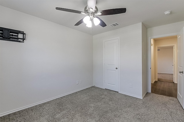 397 War Emblem Ln, Waxahachie, TX 75165 - unfurnished bedroom with carpet, baseboards, and ceiling fan