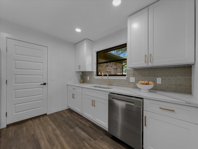 777 NW Charlyne Dr, Burleson, TX 76028 - kitchen with stainless steel dishwasher, a sink, dark wood-style flooring, decorative backsplash, and white cabinetry