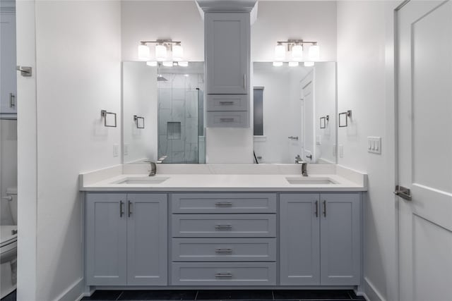 216 Pauline St, Arp, TX 75750 - full bath featuring toilet, a shower stall, double vanity, and baseboards