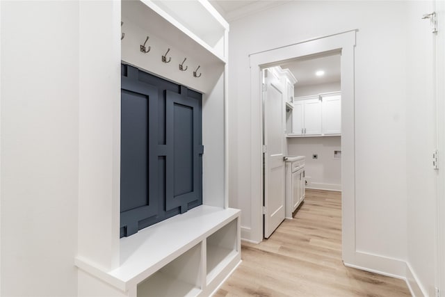216 Pauline St, Arp, TX 75750 - mudroom featuring light wood-type flooring and baseboards