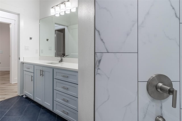 216 Pauline St, Arp, TX 75750 - full bathroom featuring vanity, tile patterned flooring, and a shower